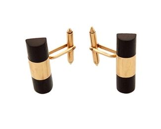 1062
A Pair Of William Spratling 18k Gold And Ebony Cufflinks
William Spratling (1900-1967)
Circa 1951-1967, Third Design Period; Taxco, Mexico
Each stamped for William Spratling; Further stamped: 18K
A pair of domed cylindrical cuff links with ebony accents, 2 pieces

Each: 0.375" H x 1.125" W
9.6 grams gross
Estimate: $600 - $900