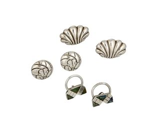 1077
A Group Of William Spratling Earrings
William Spratling (1900-1967)
Circa 1940-1944, First Design Period; Circa 1951, Second Design Period; Taxco, Mexico
Two stamped for William Spratling and for silver; Serpent earrings further stamped: Spratling of Mexico / Silson, Inc / Pat. Pending; Arrow earrings: Sterling / Mexico / [Conquistador shield] / [Eagle 11]
Comprising three pairs of earrings, including a pair of sterling repousse shell earrings (Each 1" H x 1.5" W); a pair of Silson round earrings with a serpent design (Each 1" Dia.), and a pair of sterling and azurmalachite inlay arrow design earrings (Each 1.375' H), 6 pieces

56.0 grams gross
Estimate: $600 - $800