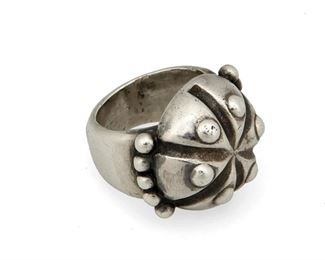 1102
A William Spratling Sterling Silver Ring
William Spratling (1900-1967)
Circa 1940-1944, First Design Period; Taxco, Mexico
Stamped for William Spratling; Further stamped: Made in Mexico / Spratling Silver
A sterling silver ring with segmented dome and silver ball accents

Ring size: 6
16.0 grams
Estimate: $200 - $400