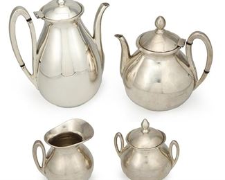 1131
A Four Piece Silver-Plate Tea Service
Mid-20th century
Stamped for A.S. Gonzalez; Further stamped: Hecho en Mexico / Monterrey N.L. / Sterling 0.925 Plata
A silver-plated tea set comprising of a tea pot (7.25" H x 6.5" W x 4.75" D), coffee pot (9.5" H x 7.5" W x 4.5" D), creamer (4.5" H x 4.125" W x 3.5" D) and covered sugar (4.75" H x 4.75" W x 3.75" D), 4 pieces
Estimate: $800 - $1,200