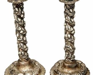 1132
A Pair Of Mexican Sterling Silver Candlesticks
Mid-20th century
Stamped: 925; further illegible marks
Each sterling silver pillar-form candlestick with embossed chayote vine motif and various fruit decoration at base, 2 pieces
Each: 8.75" H x 4.875" Dia.
19.42 oz. troy approximately
Estimate: $200 - $400