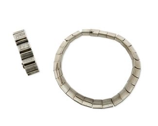1151
A Mixed Set Of Antonio Pineda Silver Jewelry
Antonio Pineda (1919-2009)
Circa 1953-1979; Taxco, Mexico
Crown mark for Antonio Pineda and Eagle 17; Each stamped: Hecho en Mexico / Silver / 970
Comprising a necklace of concave geometric links and a similar style link bracelet, 2 pieces

Necklace: 17.5" L x 0.5" H; Bracelet: 6.5" L x 0.75" H
257.0 grams
Estimate: $1,000 - $2,000