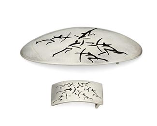 1161
Two Antonio Pineda Lascaux-Motif Silver Belt Buckles
Antonio Pineda (1919-2009)
Circa 1953-1979; Taxco, Mexico
Crown mark for Antonio Pineda and 970; Each variously stamped: [Eagle 17] / [Eagle 3] / Hecho en Mexico / Silver / [design number] / Taxco Mexico VJ
Comprising two shadowbox style belt buckles depicting Lascaux-inspired hunting scenes, one a large oval buckle (PZ148; 2.5" H x 5.75" W), and a smaller rectangular buckle (1.125' H x 2.375" W), 2 pieces

175.5 grams
Estimate: $500 - $700