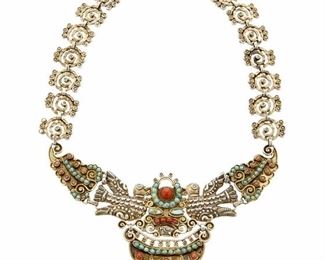 1188
A Matl Sterling Silver And Vermeil Necklace
Matilde Poulat (c. 1900-d. 1960)
Circa 1935-1948; Taxco, Mexico
Stamped to plaques: Matl / Hecho en Mexico / 0.925
Designed by Matilde Poulat, an elaborate silver and gold wash link necklace with dove-motif articulated centerpiece with set turquoise and coral accents and a turquoise fringe

17.5" L x 3.125" H
92.8 grams gross
Estimate: $3,000 - $5,000