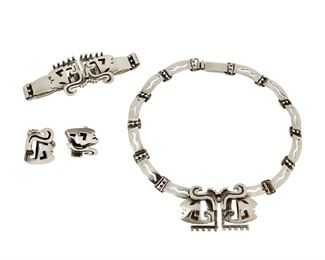1223
A Group Of Salvador Teran Sterling Silver Jewelry
Salvador Teran (c. 1920-d. 1974)
Circa 1955-1970; Mexico City, Mexico
Each stamped: Salvador / Sterling / Mexico / 132 / [Eagle 36]
Comprising a silver Mayan warrior-inspired collar necklace (14" L x 1.25" H), a matching bracelet (6.5" L x 1.325" H), and a pair of screw-back earrings (1.125" H), 4 pieces

132.6 grams
Estimate: $800 - $1,200