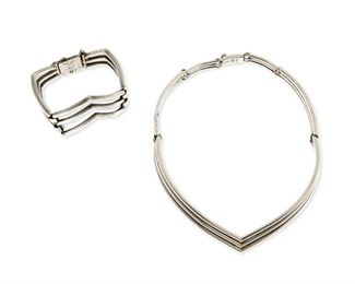 1226
A Set Of Salvador Teran Sterling Silver Jewelry
Salvador Teran (c. 1920-d. 1974)
Circa 1955-1970; Mexico City, Mexico
Each stamped: Salvador / Mexico / Sterling / [Eagle 36] / 161
Comprising a three-wire link collar necklace and matching zigzag wire hinged bracelet, No. 161, 2 pieces

Necklace: 16" L x 0.5" H; Bracelet: 7" L x 2" H
125.9 grams
Estimate: $400 - $600