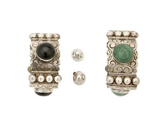 1230
A Mixed Group Of Parra Silver Jewelry
Horacio de la Parra (b. 20th century)
Circa 1945-1948; Mexico City, Mexico
Each bracelet stamped: PARRA / Silver / Mexico; One earring stamped: PARRA / Mexico / 925 / [Eagle 30] / Alpaca [clip]; one earring: JP / Hecho en Mexico / 925
Comprised of a three-panel hinged bracelet with green hardstone cabochons, silver balls and incised foliate designs, a similar style three-panel hinged bracelet with large round onyx stones, and a near-pair of silver ball earrings, 4 pieces

Each bracelet: 7" L x 1.375" H; Each earring: 0.625" Dia.
216.0 grams gross
Estimate: $400 - $600