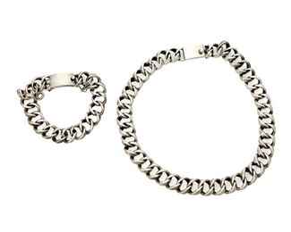 1248
A Set Of Margot De Taxco Sterling Silver Jewelry
Margot Van Voorhies (1896-1985)
Circa 1948-1978; Taxco, Mexico
Each stamped: Margot de Taxco / Sterling / Made in Mexico / [Eagle 16] / 5370
Comprising a sterling chain link collar necklace and matching link charm bracelet No. 5370, 2 pieces

Necklace: 16.5" L x 0.625" H; Bracelet: 8" L x 0.625" H
194.4 grams
Estimate: $400 - $600