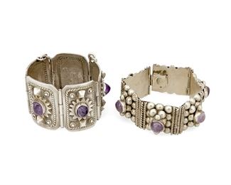 1269
Two Mexican Silver And Amethyst Bracelets
Mid-20th century
Two works:

A Jorge "Chato" Castillo silver and amethyst bracelet
Pre-1948; Taxco, Mexico
Stamped: JC [conjoined] / Taxco / 980
A five-link sterling bracelet with applied geometric motifs, each link
with a central set amethyst
6" L x 1.75" H

A six-link silver and amethyst bracelet with stacked ball motif
Stamped to clasp: [partial] Hecho___ / Guadal / Alpaca
7.375" L x 1" H

2 pieces
187.5 grams gross
Estimate: $500 - $700