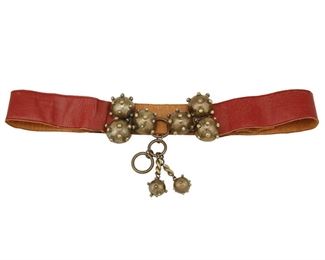 1274
A Hubert Harmon Brass Belt Buckle
Hubert Harmon (1913-2004)
Circa 1942-1948; Taxco, Mexico
Stamped: Hubert Harmon / Mexico
Designed with whimsical stylized "Sputnik" brass bomb clusters in two parts, with the original attached red leather belt

2.375" H x 7" W (closed buckle); Belt: 29" L x 1.5" H
Estimate: $400 - $600