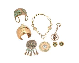 1276
A Group Of Mixed Metal Casa Maya Mexican Jewelry
Mid-20th century
Each stamped: Maya / Mexico
A group of six works including a copper cuff bracelet with a brass and enamel figural motif (6.25" inner C x 2.5" H), a hammered copper and enamel serpent cuff (7.5" inner C x 2.25"H), a pendant necklace (16" L x 3" H), a round pendant/ brooch with filigree wire overlay and dangles with green stone beads (3.25" H x 2" W), a figural key chain (4.75" H x 1.5" W), and a pair of round screw post earrings, each with a central green stone (Each: 0.875" Dia.), 7 pieces
Estimate: $300 - $500