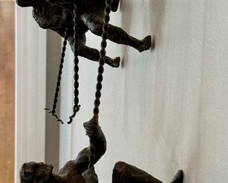 Set of 3 Climbing Men-Wall Mounted Bronze. Made of Cast Iron and very heavy.