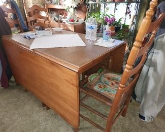 Drop leaf dining table and 4 rush seat chairs