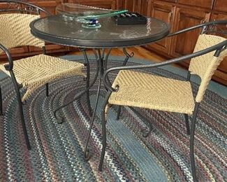 Bistro set & braided rug