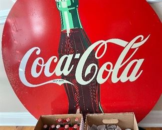 Coca-Cola sign & commemorative bottles