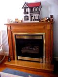 super gas burning free standing solid oak fireplace-- add to a living, family or romantic bedroom-- real flames