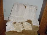 antique baby clothes  including christening gown, several 1940's doll dresses
