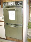 stainless appliances are SOO retro-- why not buy the REAL thing-- great working double stainless stoves, just pull em out!