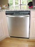 Frigidaire Gallery series dishwasher with garbage disposal, sanitizing cycle, top and lower rack sererate setting