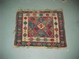 Oriental rug for saddle (?)