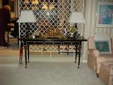 Beautiful lacquer sofa table opens up and swivels to create an entire dining table!