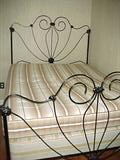Great antique wrought Iron bed in great condition, newer matteress