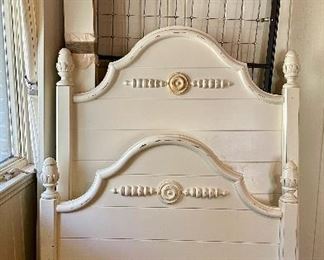 White twin bed.  Sold