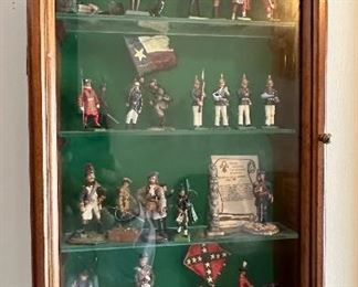Display of miniature toy soldiers.