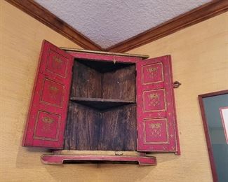 Antique mounted corner cabinet 