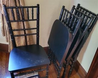 4 Folding black chairs 