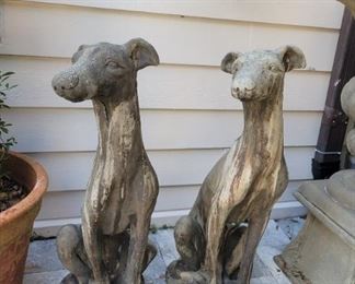 Pair of concrete dog statues 