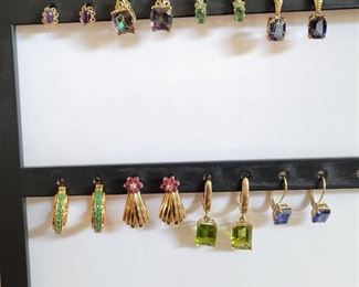Gold earrings with emeralds, ruby, peridot and more