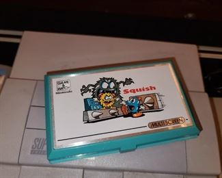 Vintage Nintendo "Squish" Game & Watch Portable Console