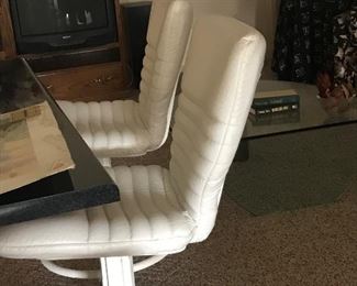 Three white barstools