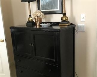 Black painted wood chest of drawers, lamps, picture