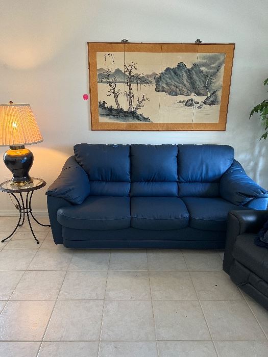 Blue leather sofa and recliner