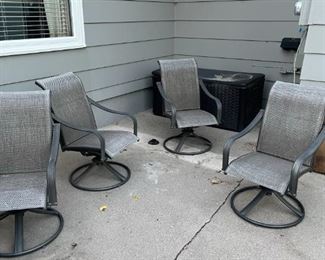 Set of 4 patio chairs. They swivel and rock