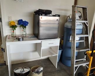 Small fridge, step ladder, desk