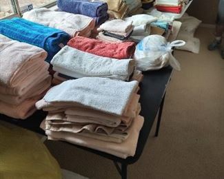 Linens, including towels, sheets and comforters for queen beds