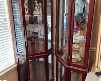 Pair lighted curio cabinets