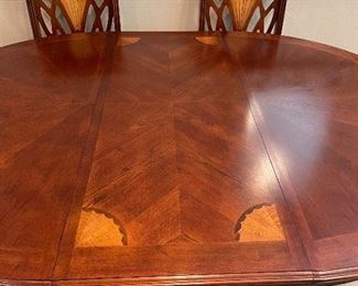 Dining table with inlaid wood