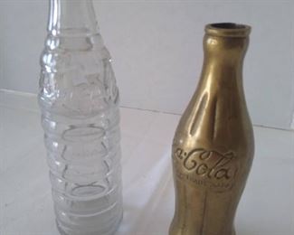 Unusual soda bottle and second Coca-Cola gold display bottle