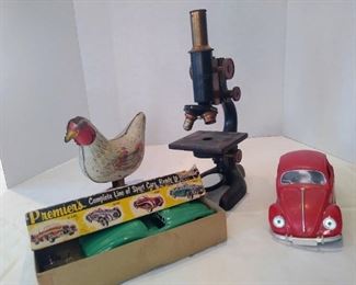 Tin litho chicken toy-model car in box - early microscope - cast Volkswagon toy