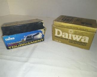 Daiwa baitcasting reels in box