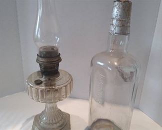 Aladdin oil lamp and store display liquor bottle