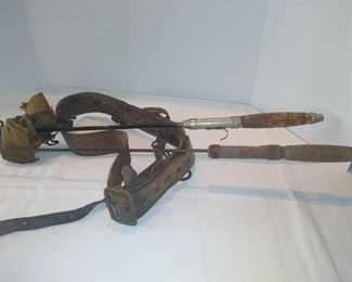 Vintage steel fishing rods and leather belt