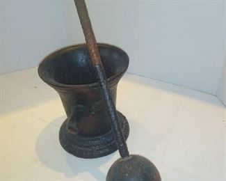 Very large iron mortar and pestle