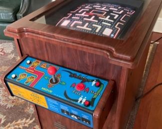 Galaga & Ms. PAC-Man cocktail lounge console game unit by NAMCO. Measures 37” long, 20 1/4” wide and 29 3/4” tall.
