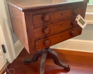 Antique 19th century Empire work table with hairy paw feet measures 21 1/2” wide, 17 1/2” long and 29 1/2” tall.