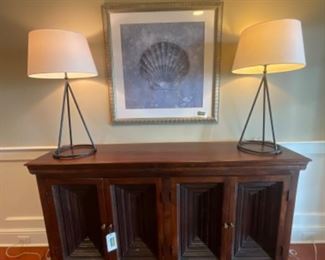 Large modern sideboard measures 69 1/2” wide, 17” long and 40” tall.